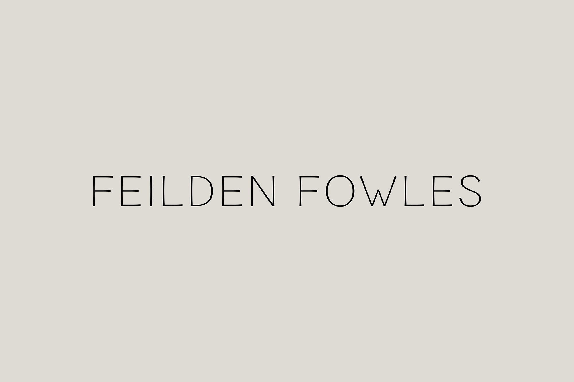 Text art featuring the name 'Feilden Fowles' in a thin, sans-serif typeface, set against a solid, neutral-toned background.