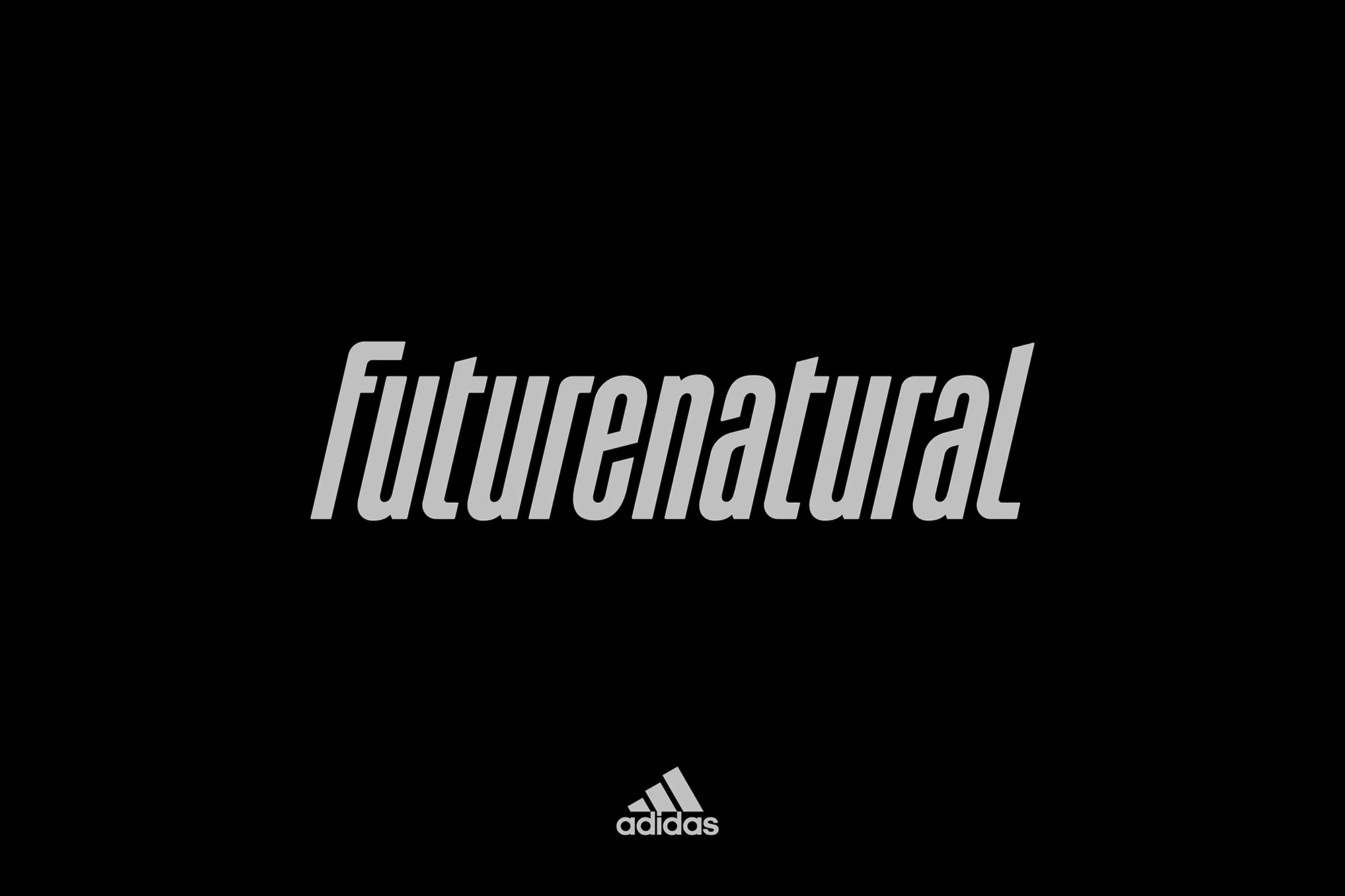 Adidas brand advertisement with the word 'futurenatural' in stylized gray font against a dark black background, showcasing minimalism.