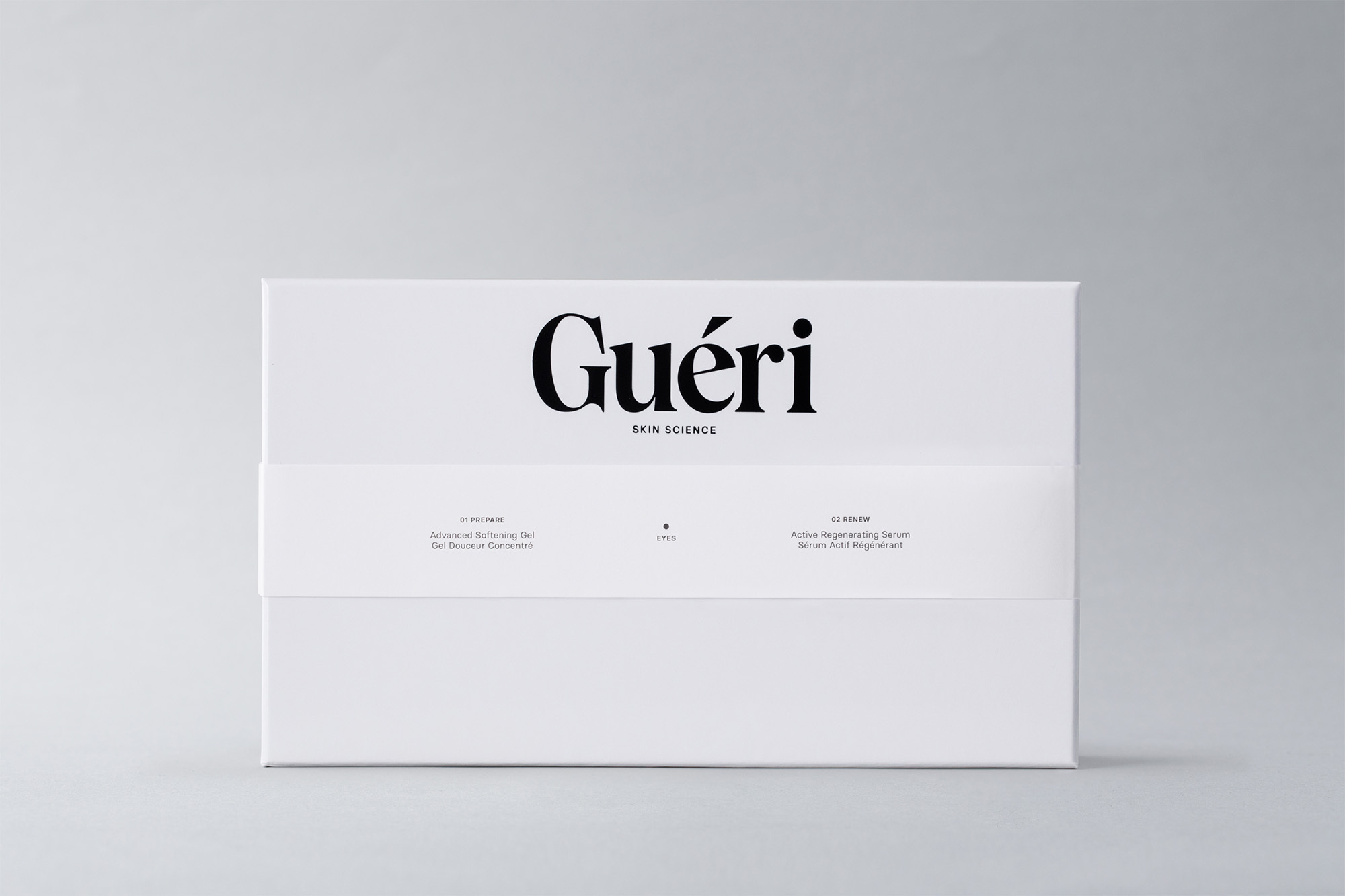White Gueri skincare box featuring black logo and text descriptions against a neutral background, clean product shot.