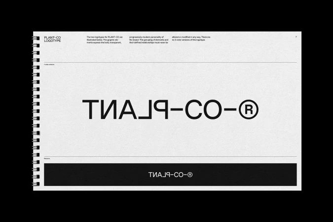 Open notebook displaying PLANT-CO logo variations in black ink on white pages, highlighting brand identity and design elements.