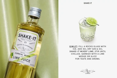 Bottle of Shake-It lime cordial mixer against a draped green satin background next to a recipe graphic for a gimlet cocktail