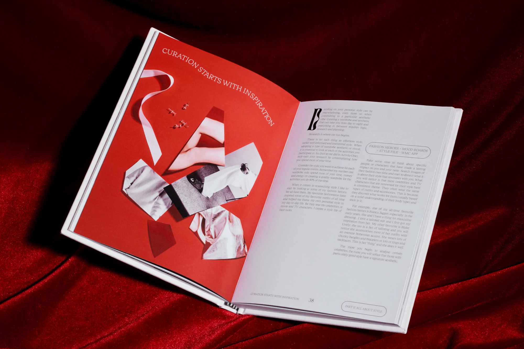 Open book on red satin fabric. Left page features collage of fabric and jewelry under text 'Curation Starts With Inspiration'.