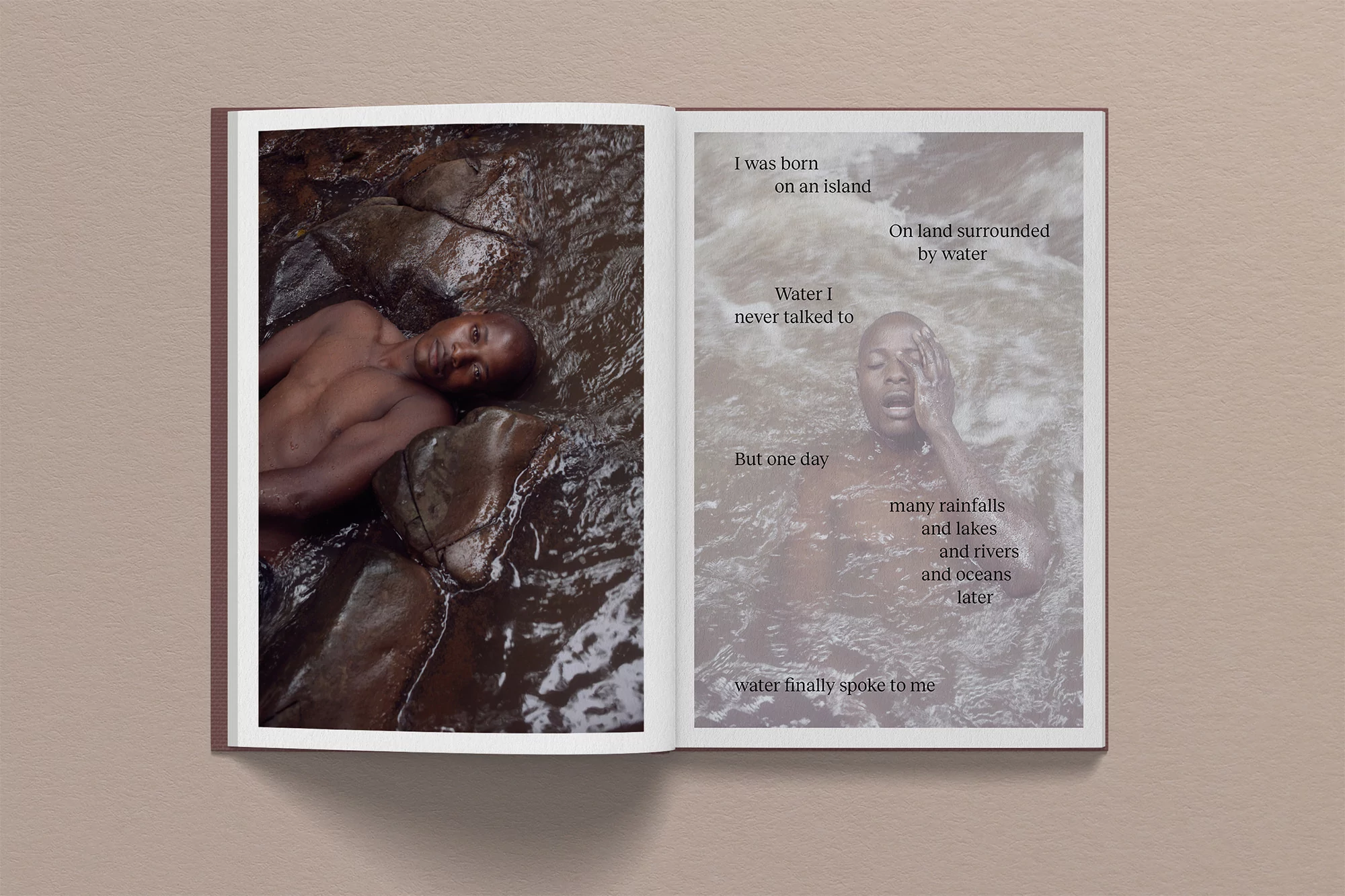 Open book displays two images: shirtless man lying on rocks in water and another man submerged in water, with poetic text overlay.