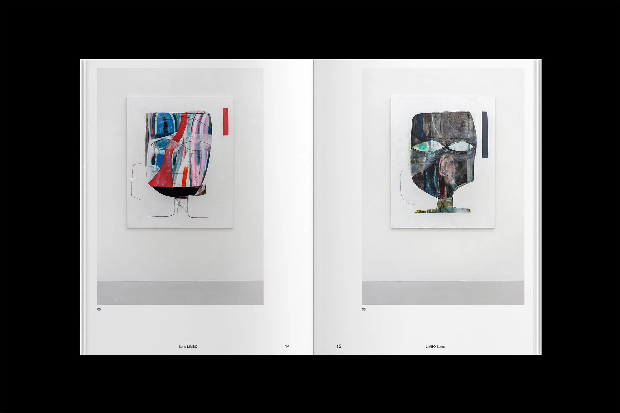 Two framed abstract paintings with contrasting color palettes are featured in an open book, displayed against a white wall.