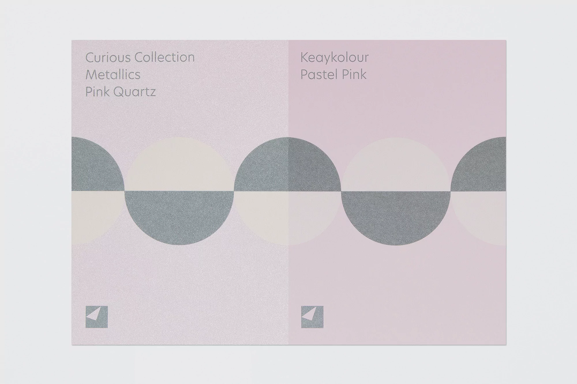 Promotional swatch card featuring geometric design and pastel hues of pink, gray, and cream on white background in eye-level, medium shot.