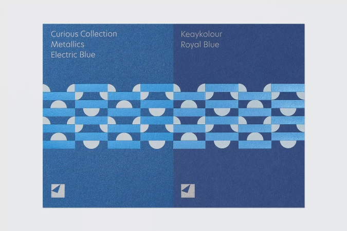 Arjowiggins paper sample showcasing Curious Collection Metallics Electric Blue and Keaykolour Royal Blue with geometric patterns