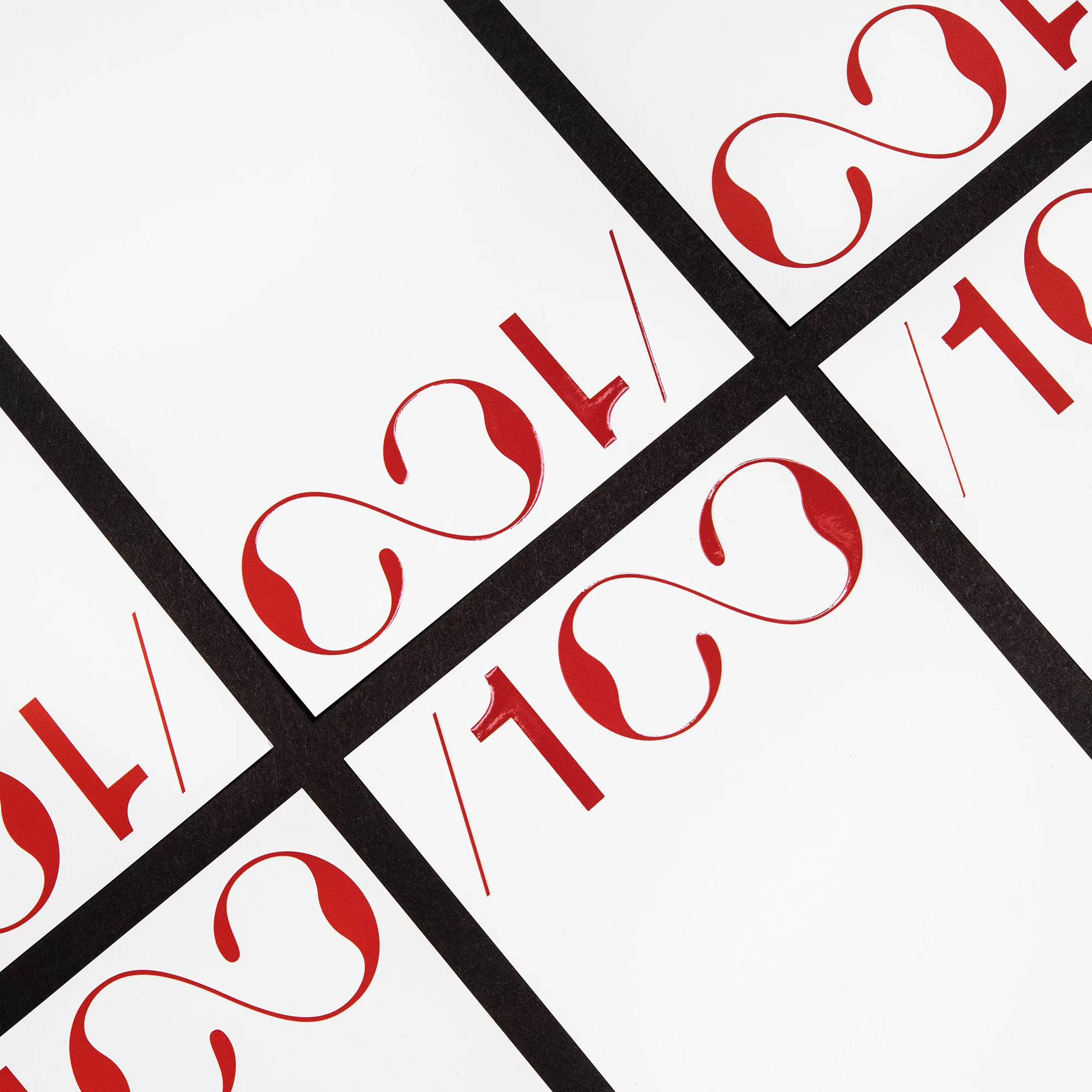 Red numbers on white cards arranged with black dividers create a minimalist, geometric composition. Clean, graphic, modern aesthetic.