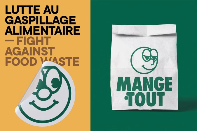 A white paper lunch bag with a green cartoon face design on a split-screen background promoting fighting against food waste.