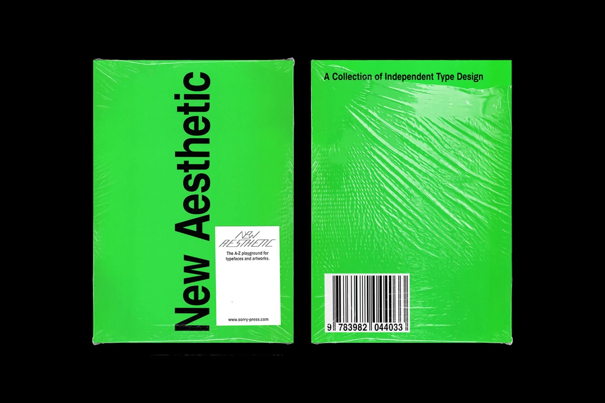 Two neon green books wrapped in plastic film, featuring typographic design, set against a black background.