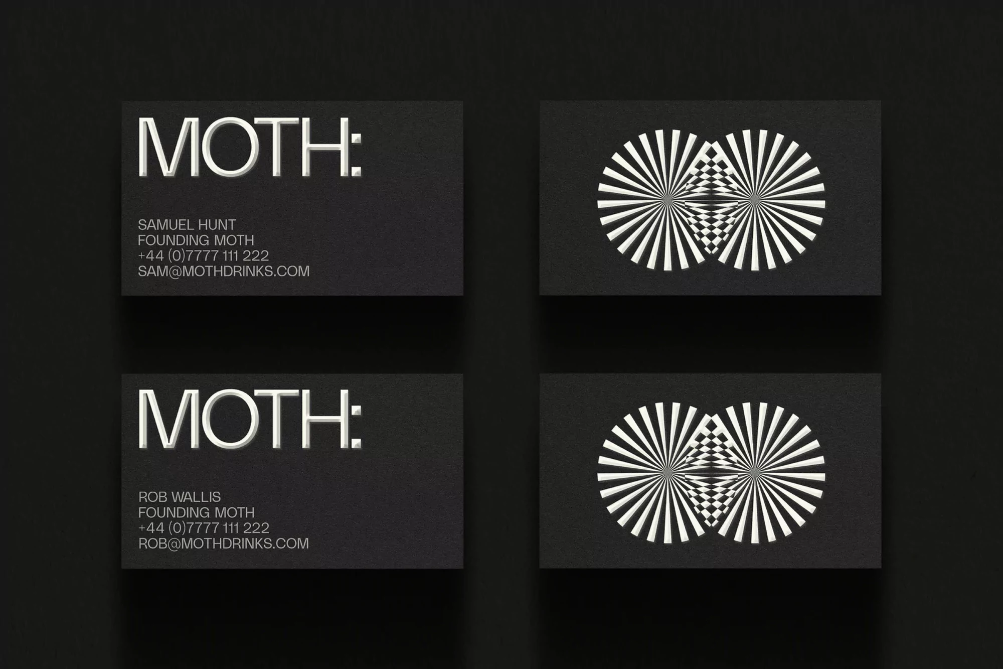 Two sets of black business cards featuring the word 'Moth' and a geometric pattern; minimalist design on a dark surface.