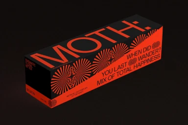 Rectangular packaging box for MOTH featuring bold red typography and geometric patterns against a matte black background.