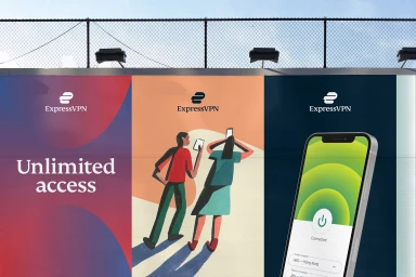 ExpressVPN outdoor advertising billboard displaying branding, illustrations of people, and a smartphone screen interface