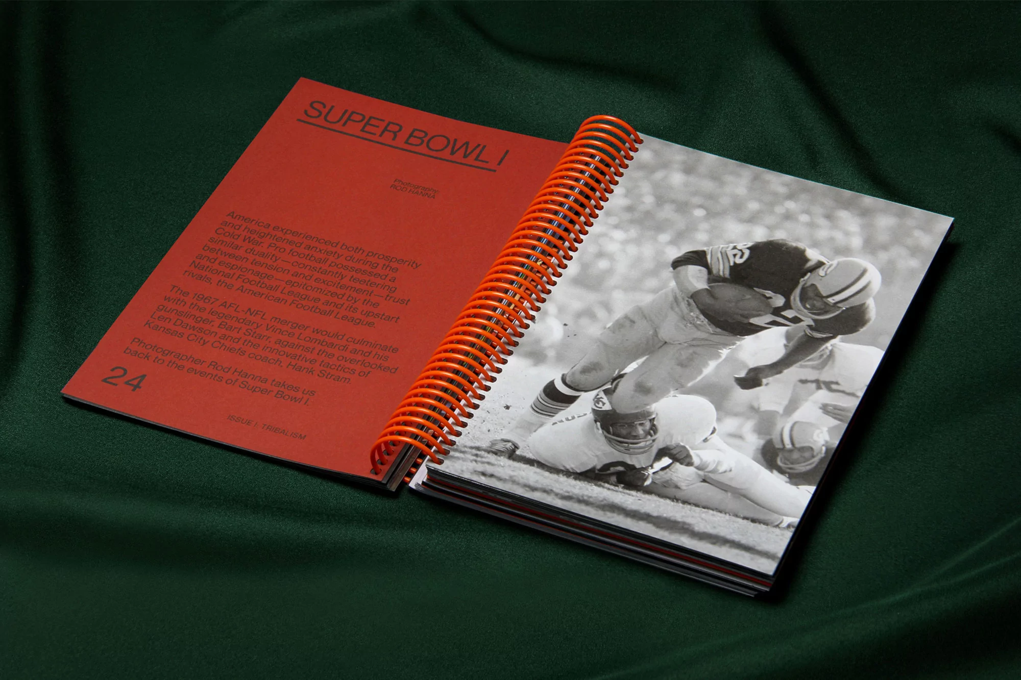 Opened book featuring a black and white image of football players on one page and Super Bowl I text on the opposite page.