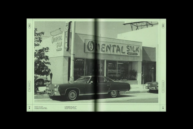 Vintage photo of Oriental Silk shop with dark sedan parked in front. Retro style image of storefront and car. 