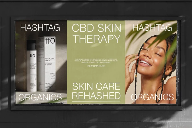 Advertisement for Hashtag Organics CBD skincare featuring a Black female model with braided hair and product packaging in muted tones.