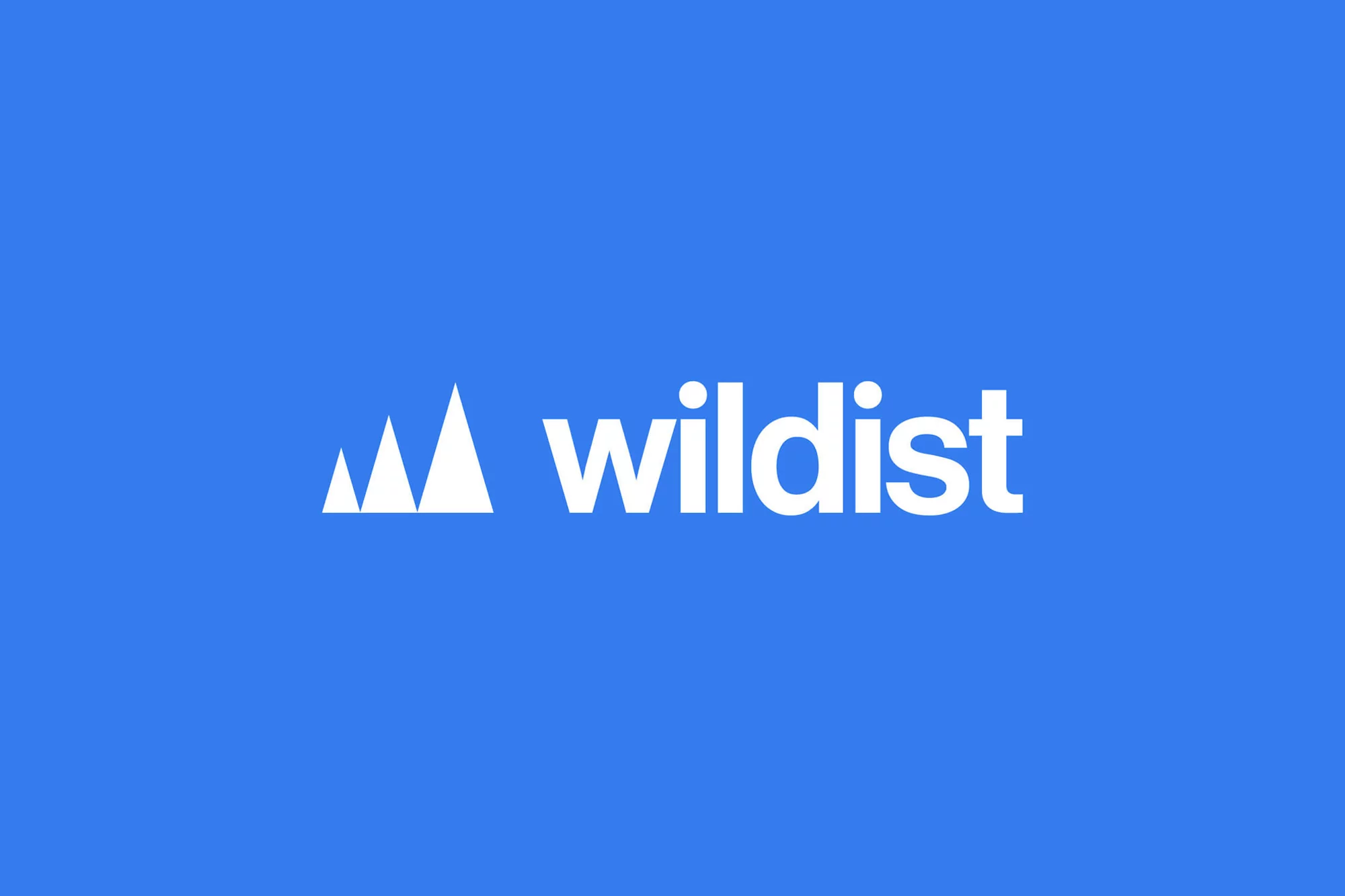 White Wildist logo against a solid blue background. The logo features three stylized mountain peaks beside the brand name.