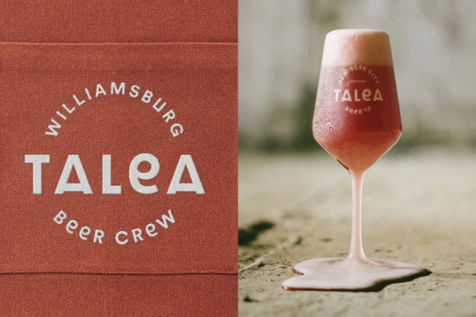 Close-up of a beer glass with the Talea Beer Co. logo and a terracotta-colored fabric with the brewery's name embroidered on it.