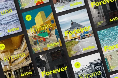 Flat lay of multiple editorial magazine covers featuring bold yellow typography and diverse graphic layouts on dark background
