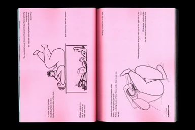 Open book with vivid pink pages featuring black line illustrations and handwritten text typography.
