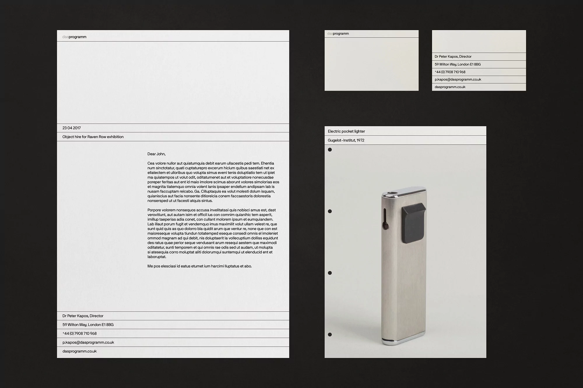 Image features a collection of stationery and documents, including a business card, letterhead, and a close-up of a silver electric lighter.