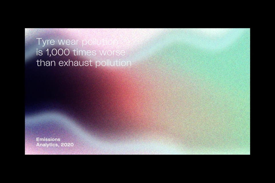 Environmental statement on tyre wear pollution versus exhaust pollution with abstract, hazy background in pastel shades of green, pink.
