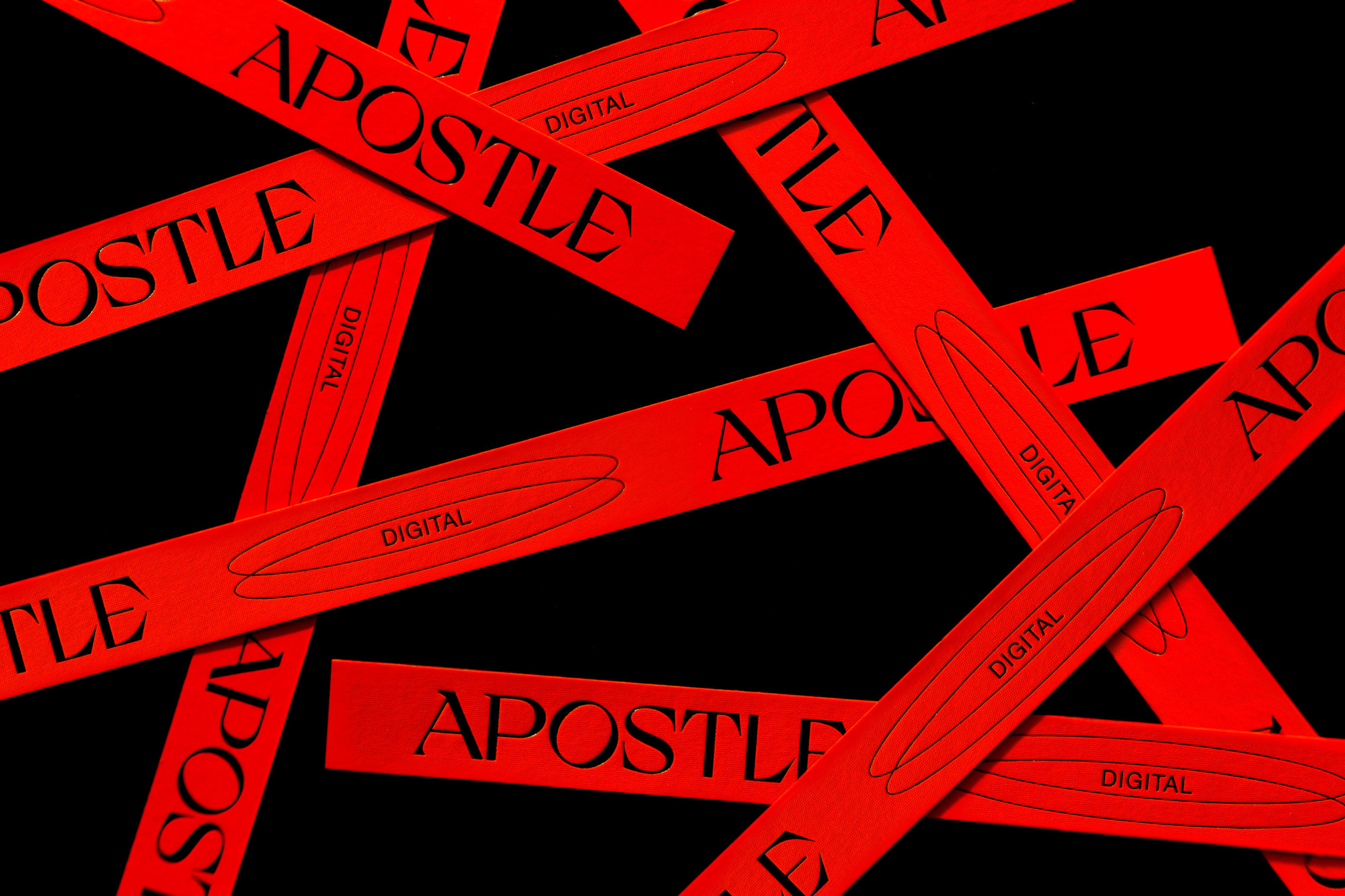 Red strips overlapping on black background, reading 'Apostle Digital'. Abstract graphic design for digital media or Apostle brand, modern art.