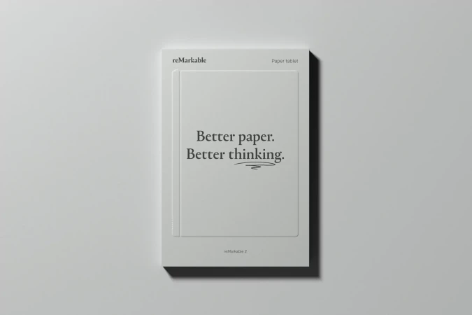 Remarkable 2 paper tablet box on a white surface with the text 'Better paper. Better thinking.' displayed in black font.