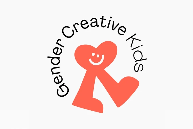 Whimsical logo for 'Gender Creative Kids' featuring a heart-shaped figure with legs and a smiling face, set against a white backdrop.
