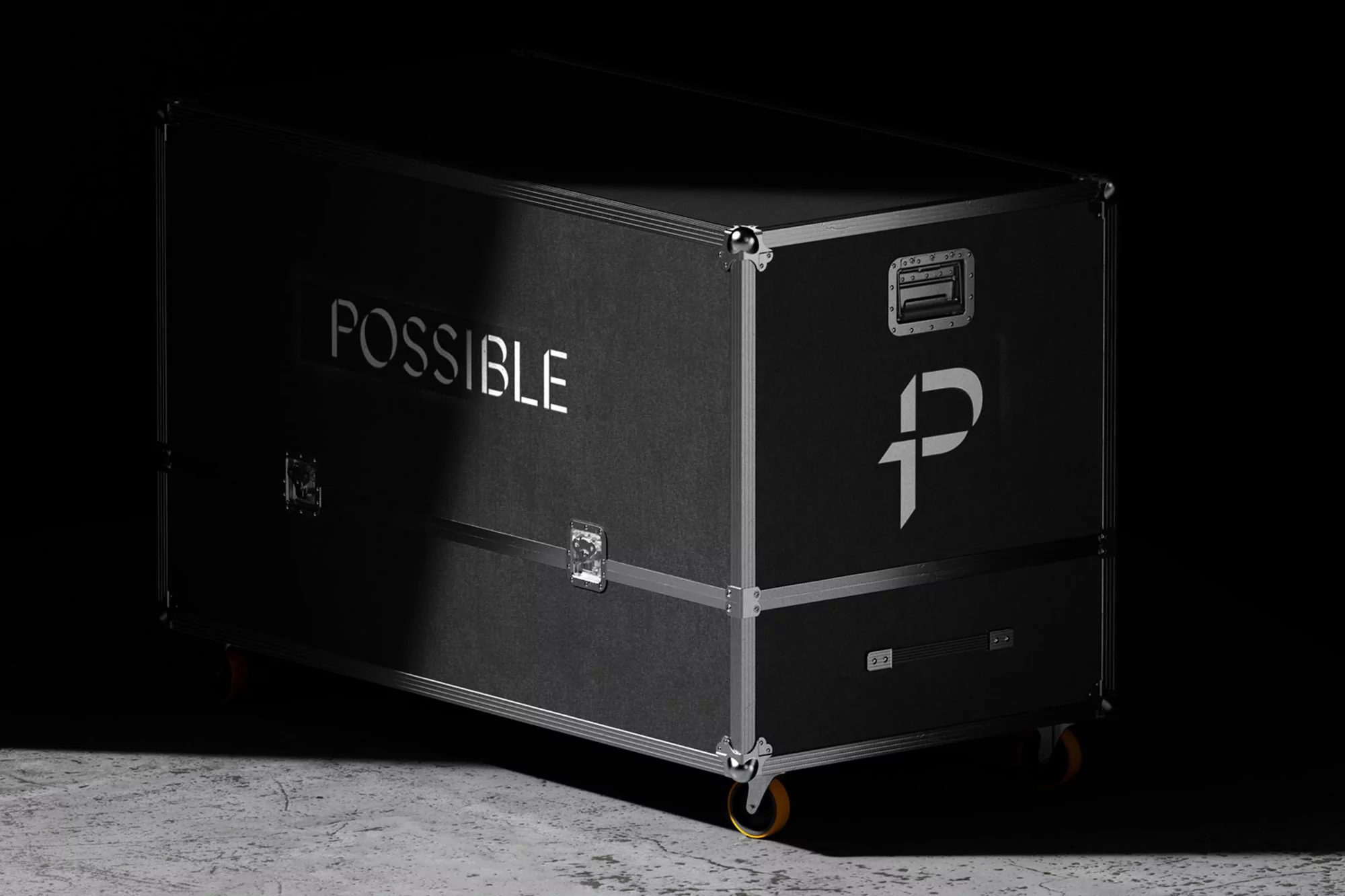Black equipment case on wheels with the word 'POSSIBLE' and a stylized P logo against a dark background, creating a modern industrial look.