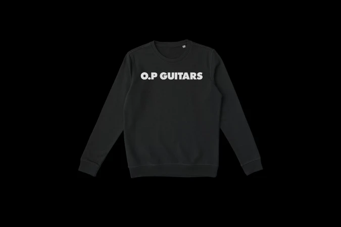 Black long-sleeve shirt with the text O.P. GUITARS printed in white across the chest, presented against a black backdrop.