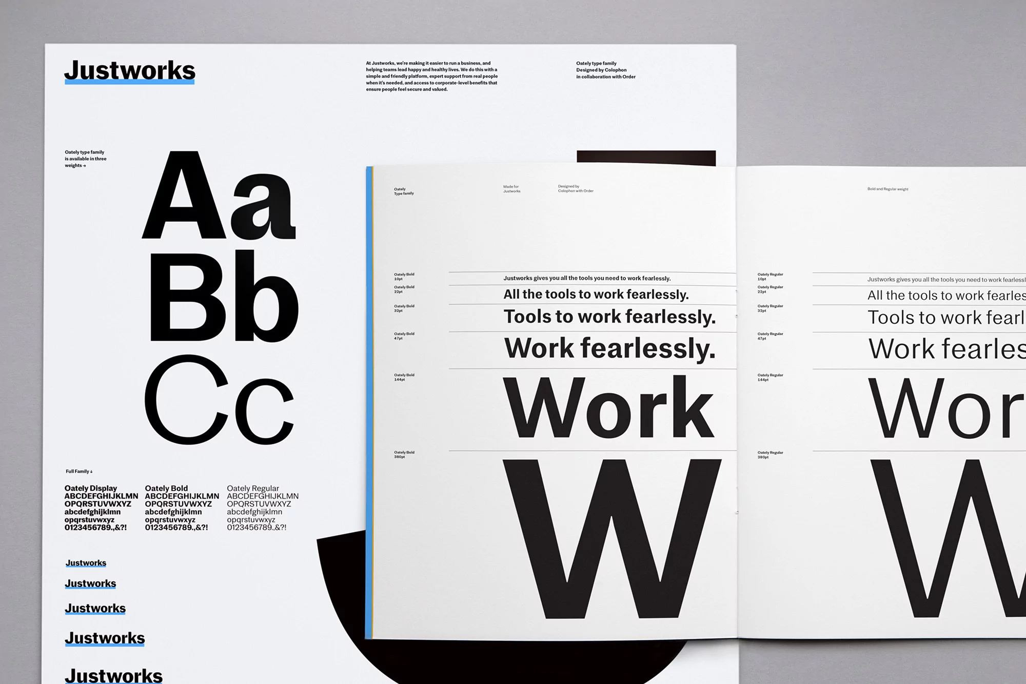 Open typography book featuring the Justworks brand, showcasing a variety of fonts in black on white paper with a clean, modern design.