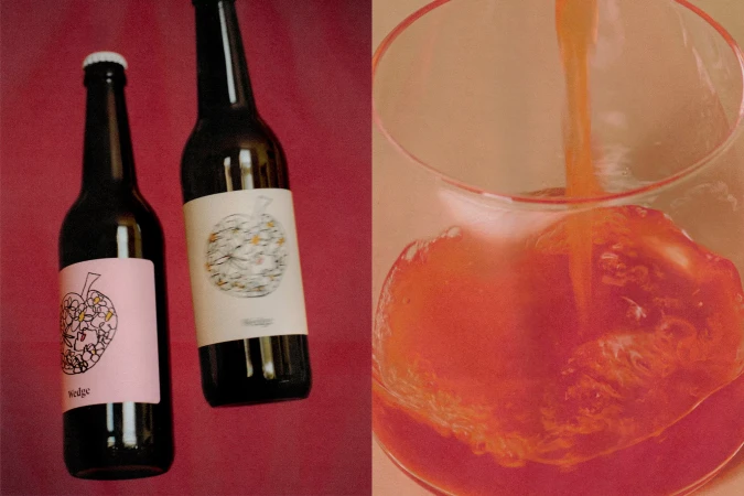 Two bottles of craft cider with apple labels on red background, and glass of cider with ice, showcasing beverage photography.