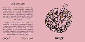 Illustrated pink apple filled with small flower outlines and text columns in English and French on a pink background.