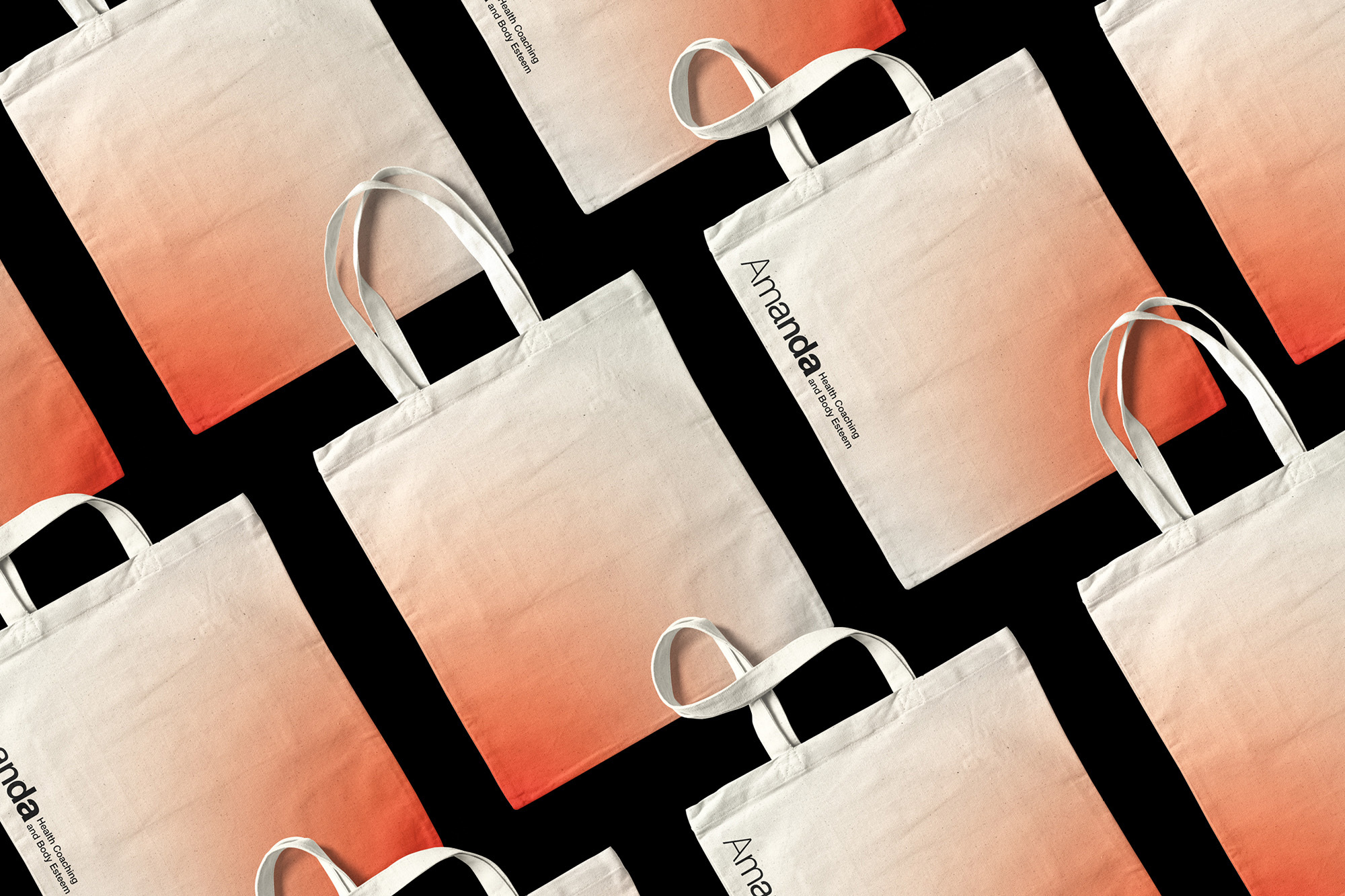 Several white tote bags with orange ombre at the bottom and a logo on a black background, arranged in a graphic pattern.
