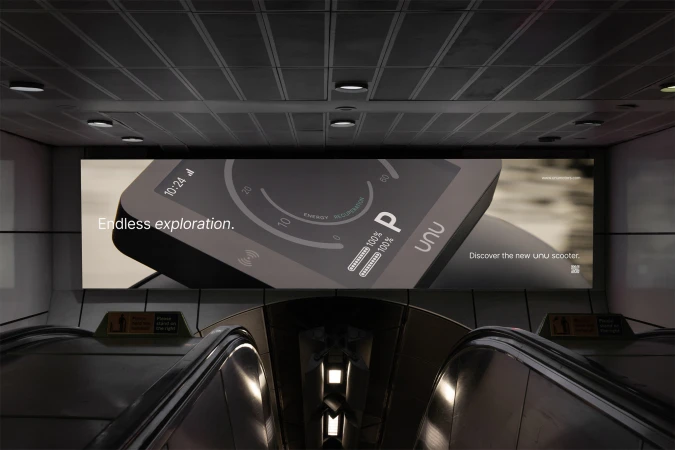 Advertisement featuring an electric scooter display, highlighting modern design and eco-friendly transportation in an urban underground setting.