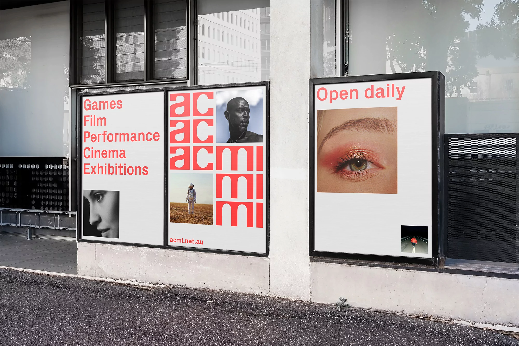 Outdoor view of two large advertising posters on the side of a building, promoting Games, Film, Performance, Cinema, Exhibitions.
