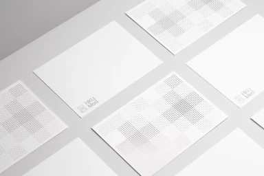 Isometric view of multiple white stationery sheets featuring grey halftone cross patterns and HKUMed branding.