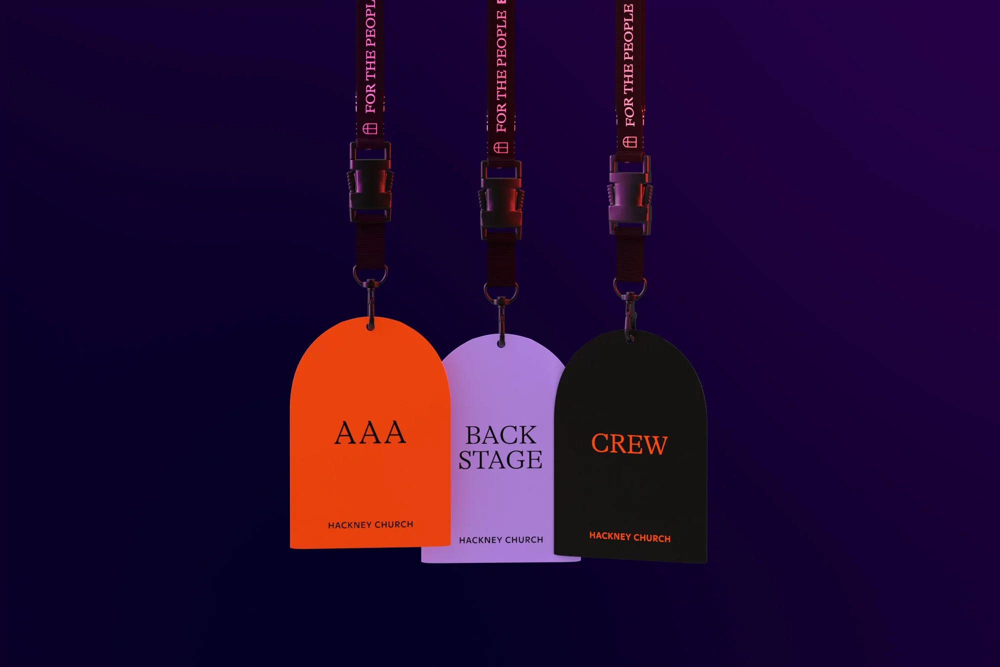Three arched passes with lanyards displaying 'AAA,' 'Back Stage,' and 'Crew' against a dark purple gradient background, illuminated with soft lighting.
