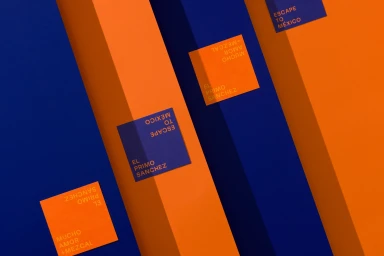 Bold geometric brand identity featuring diagonal bands of royal blue and orange with square typographic labels for El Primo Sanchez.