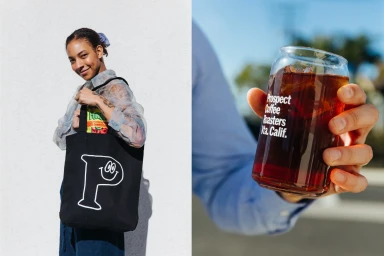 Woman holding a black tote bag with a white smiley letter P logo, and a person holding an iced coffee glass