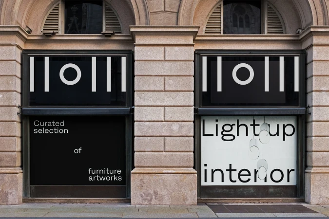 Soulgarden storefront display with large arched stone building facade and typography on windows