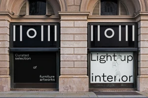 Soulgarden storefront display with large arched stone building facade and typography on windows
