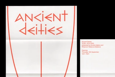 Exhibition poster with red custom typography reading Ancient Deities on textured white folded paper
