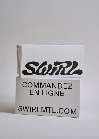 Two rectangular boxes stacked, the top one with 'SWIRL' in large black letters, the lower one with website address in black font.
