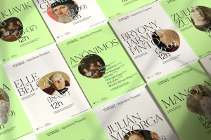 Top-down view of multiple green and white promotional posters arranged on a flat surface featuring classical paintings and bold typography