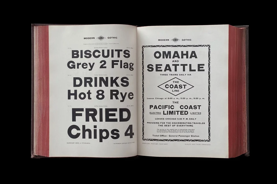 Open book featuring vintage advertising text for biscuits, drinks, and train travel to Omaha and Seattle with Pacific Coast line.
