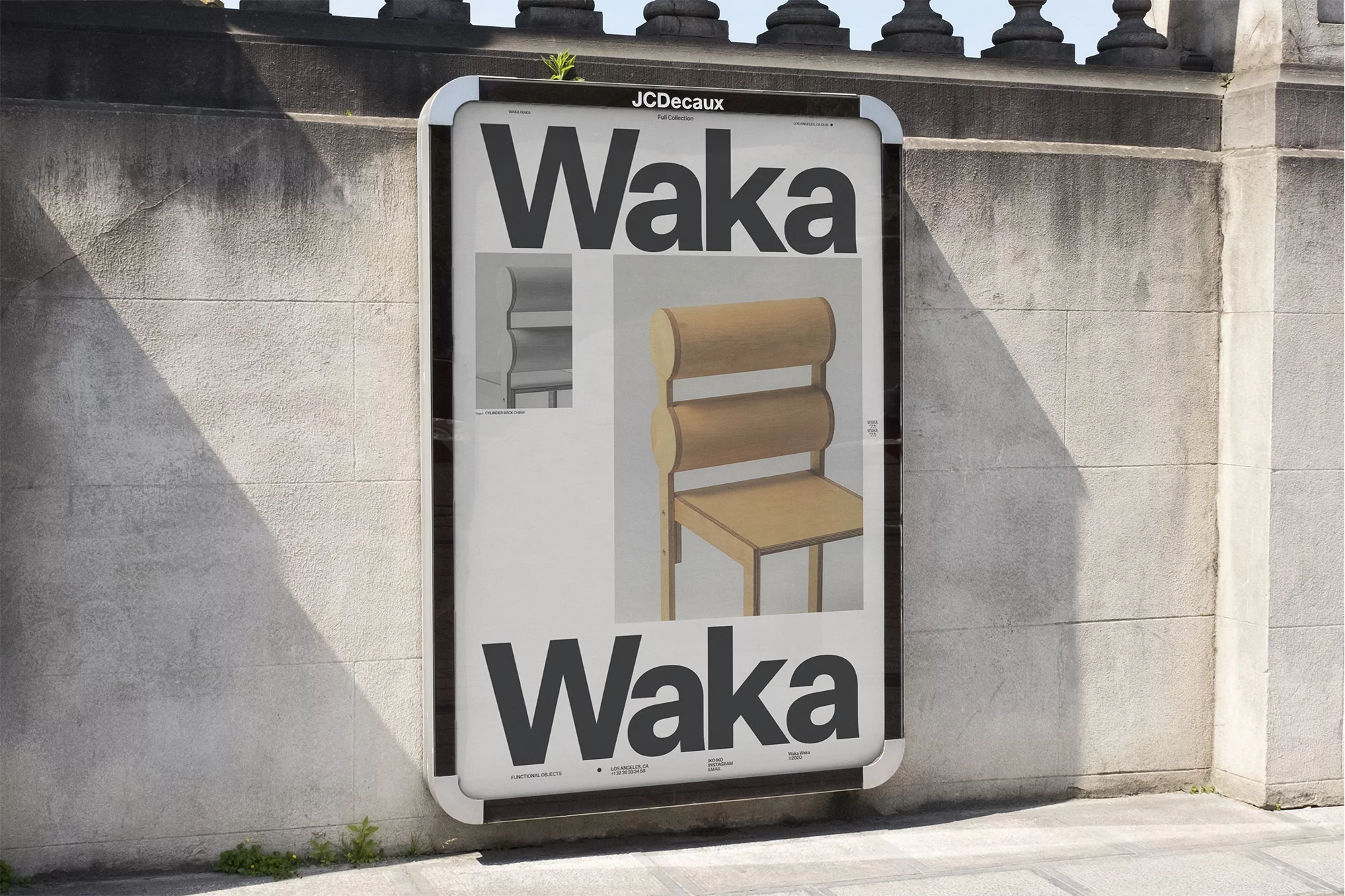 Outdoor advertising billboard featuring a chair design by Waka, displayed against a textured concrete wall in an urban setting.