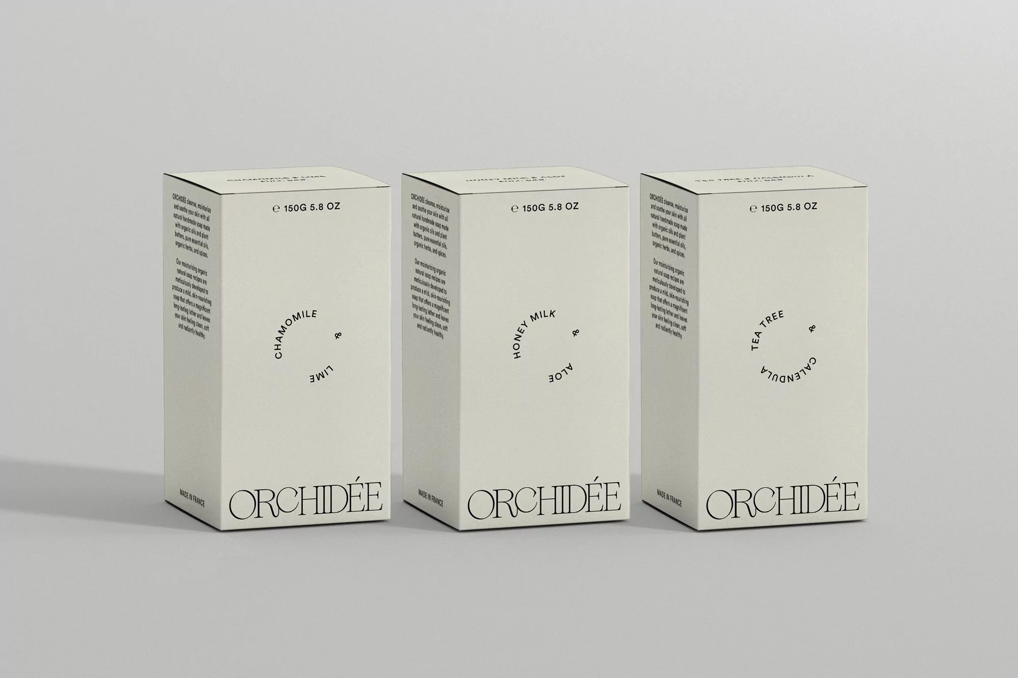 Three boxes of Orchidee beauty products are displayed against a neutral background, each box featuring different botanical ingredients.