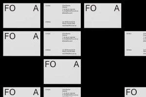 Multiple business cards arranged on a dark background featuring minimalist typography and contact information for Field Office Architecture.