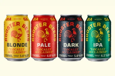 Four Rooster beer cans in yellow, red, black, and green arranged in a row against a light background